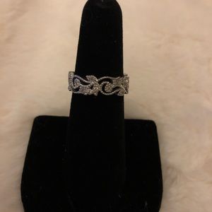 Intricate sterling silver flower filigree ring with natural white diamonds!